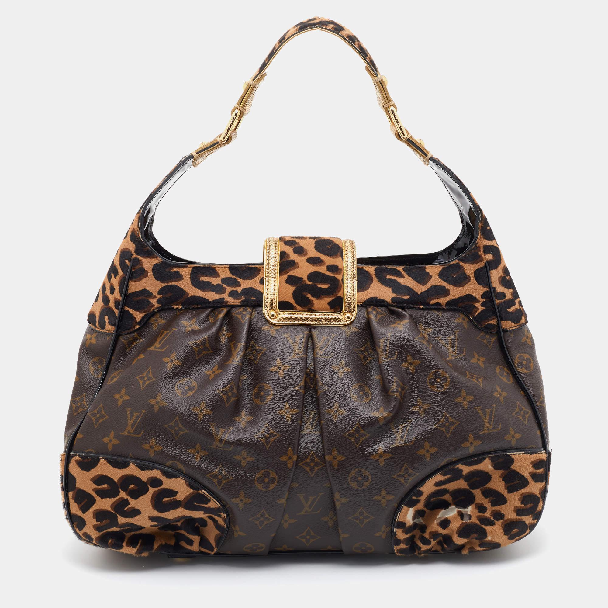Louis Vuitton's Limited Edition Polly is made from leopard-print calf hair, Karung leather, and with the charm of LV's Monogram canvas. The spacious interior of this plush bag is lined with Alcantara. Invest in this appealing creation