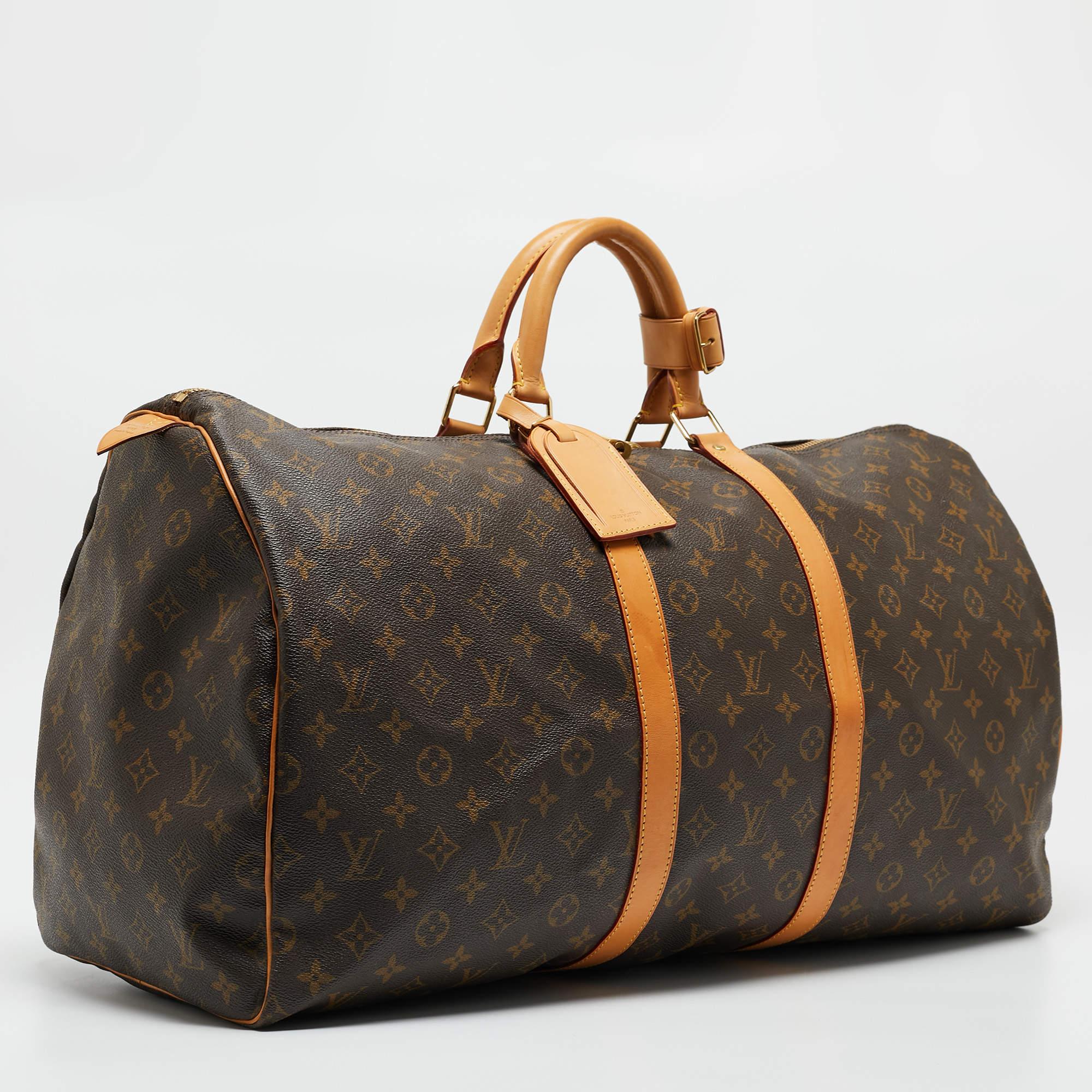 Crafted from iconic Louis Vuitton Monogram Canvas, the Keepall 55 Bag epitomizes luxury travel. Its spacious interior accommodates essentials with ease, while sturdy leather handles and trim exude sophistication. Timeless yet contemporary, this