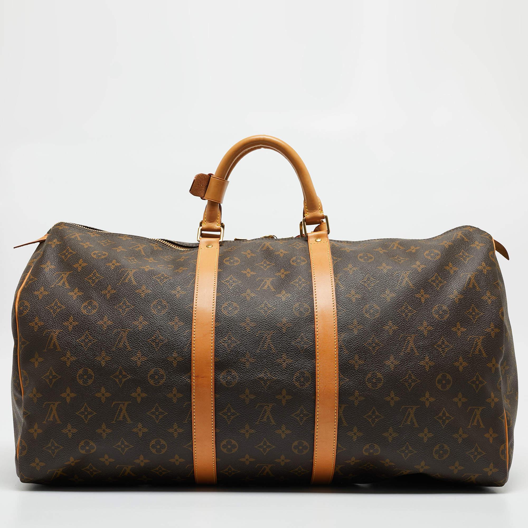 Crafted from iconic Louis Vuitton Monogram Canvas, the Keepall 55 Bag epitomizes luxury travel. Its spacious interior accommodates essentials with ease, while sturdy leather handles and trim exude sophistication. Timeless yet contemporary, this