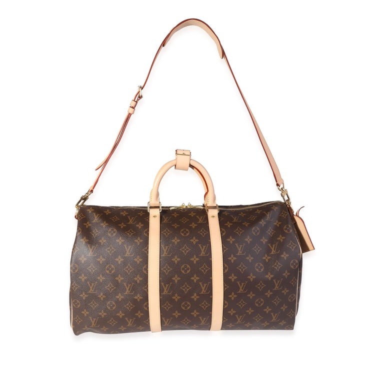 Listing Title: Louis Vuitton Monogram Canvas Keepall Bandoulière 50
SKU: 121691
MSRP: 2500.00
Condition: Pre-owned 
Handbag Condition: Very Good
Condition Comments: Very Good Condition. Pen marks to side at exterior. Light marks , discoloration, and