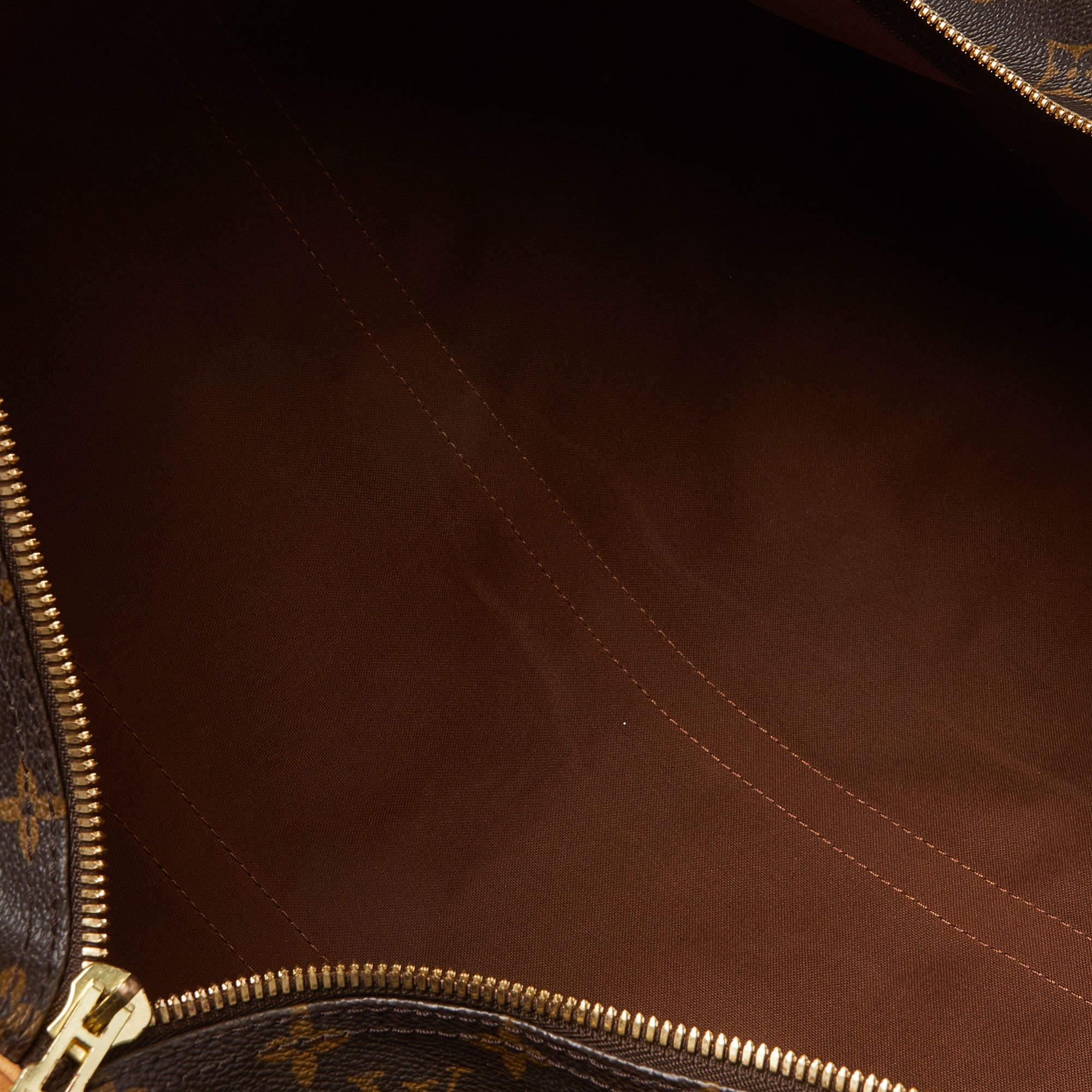 Louis Vuitton - Sac Keepall Bandouliere 60 en toile avec monogramme en vente 10