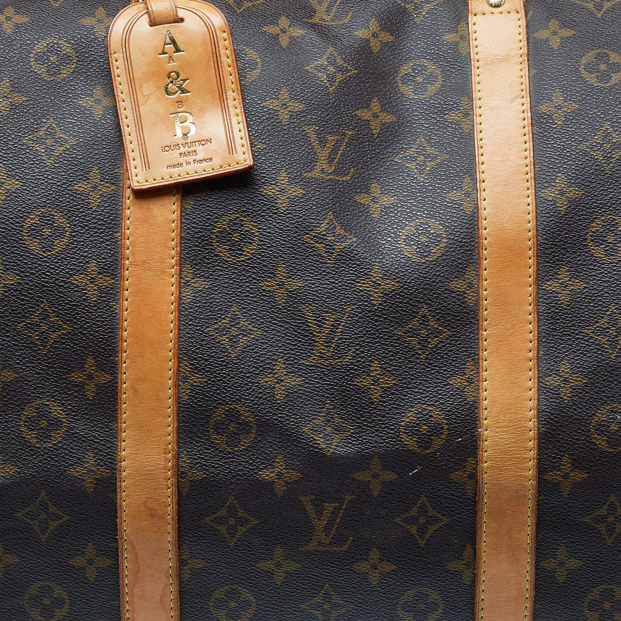 Louis Vuitton - Sac Keepall Bandouliere 60 en toile avec monogramme en vente 1