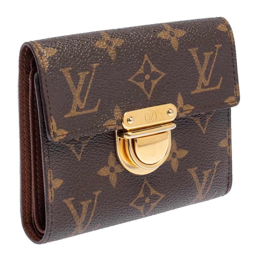 Stylish wallets are a closet must-have! This Koala wallet from the house of Louis Vuitton has been crafted from their iconic Monogram canvas with attention to detail. It has been styled as a trifold with a push lock that opens up to a leather