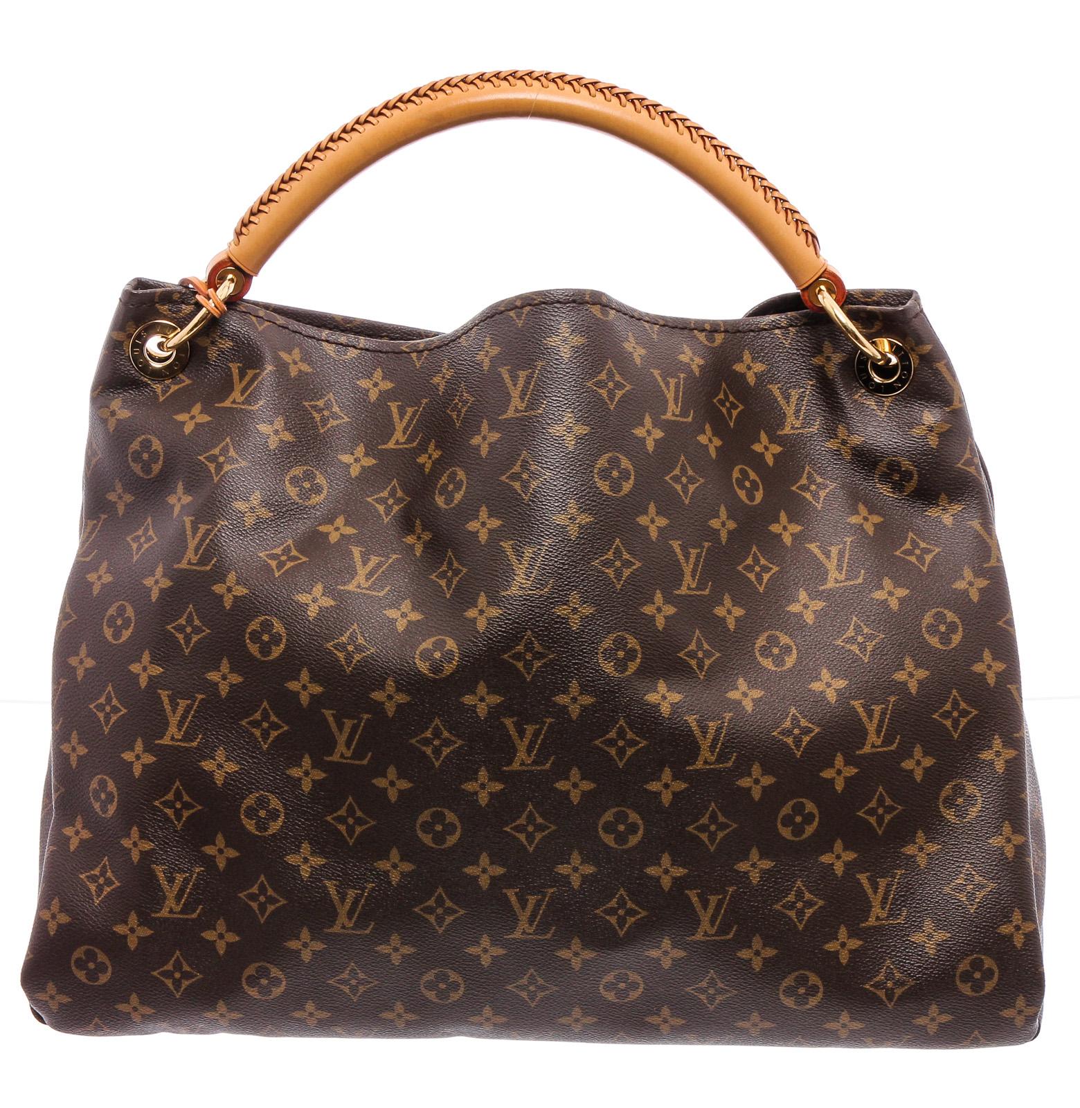 Brown and tan monogram coated canvas Louis Vuitton Artsy GM with brass hardware, single rolled top handle, tan vachetta leather trim, protective feet at base, beige Alcantara lining, seven interior pockets; one with zip closure and open top.