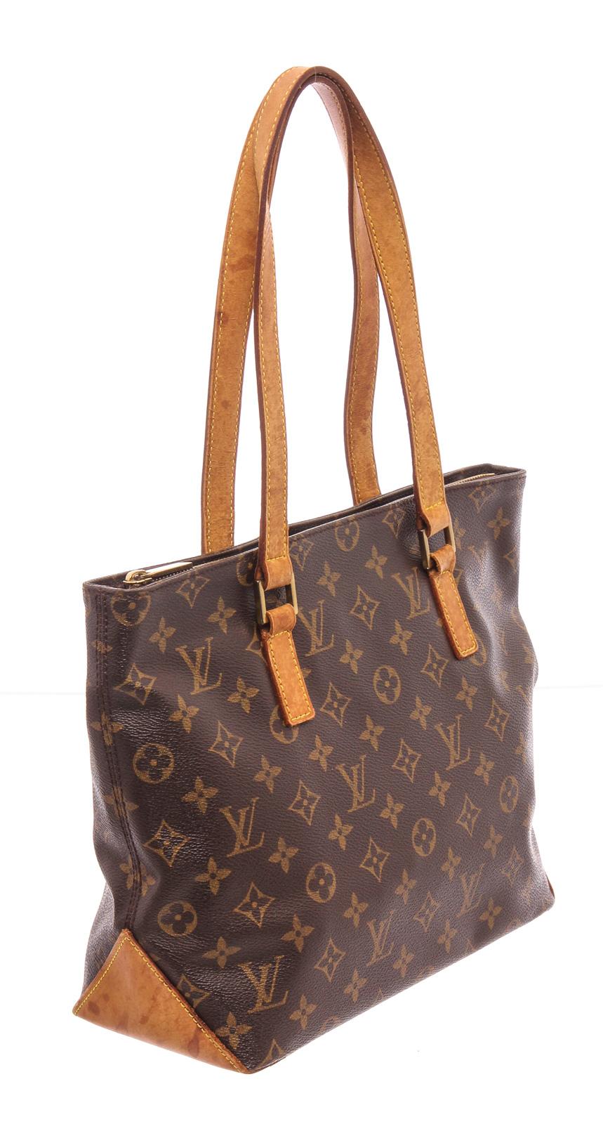 Brown and tan monogram coated canvas Louis Vuitton Cabas Piano tote with brass hardware, tan vachetta leather trim, dual flat shoulder straps, brown canvas lining, dual pockets at interior wall; one with zip closure and zip closure at top.

22058MSC