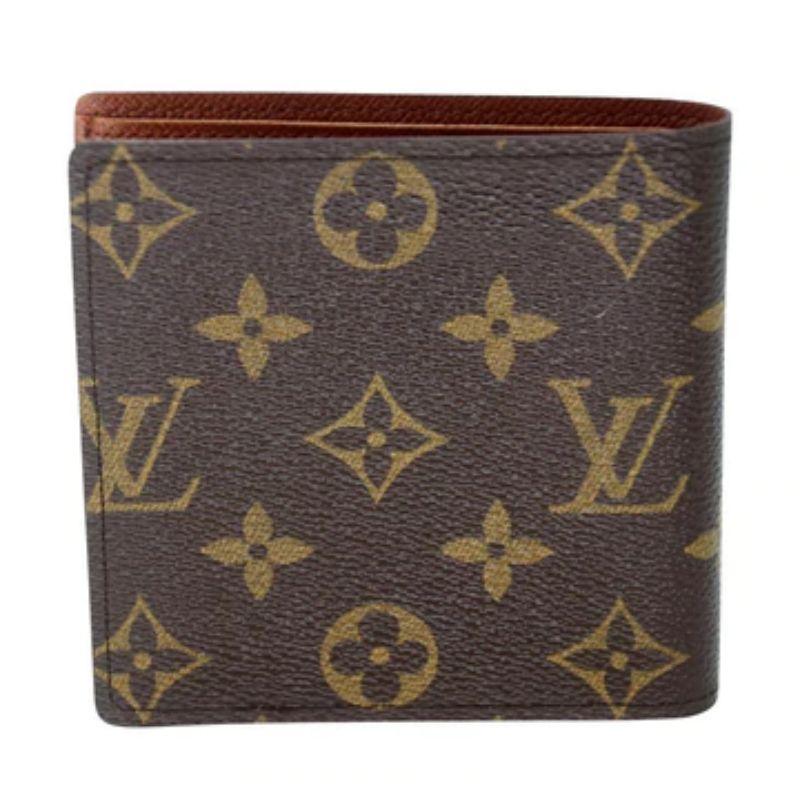 Louis Vuitton Monogram Canvas Leather LV Marco Bifold Wallet LV-0813N-0004

This Louis Vuitton Monogram Canvas Marco wallet is sleek and sophisticated. This wallet includes signature LV monogram canvas. Includes independent snapped pocket to keep