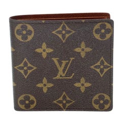 Louis Vuitton Dark Brown Leather Monogram Embossed Bifold Wallet