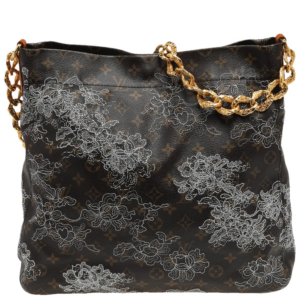 Named after the character Count Axel Fersen from the film Marie Antoinette, this Louis Vuitton Dentelle Fersen bag is a limited edition piece designed fabulously with specific attention given to every small detail. It is crafted of coated canvas &
