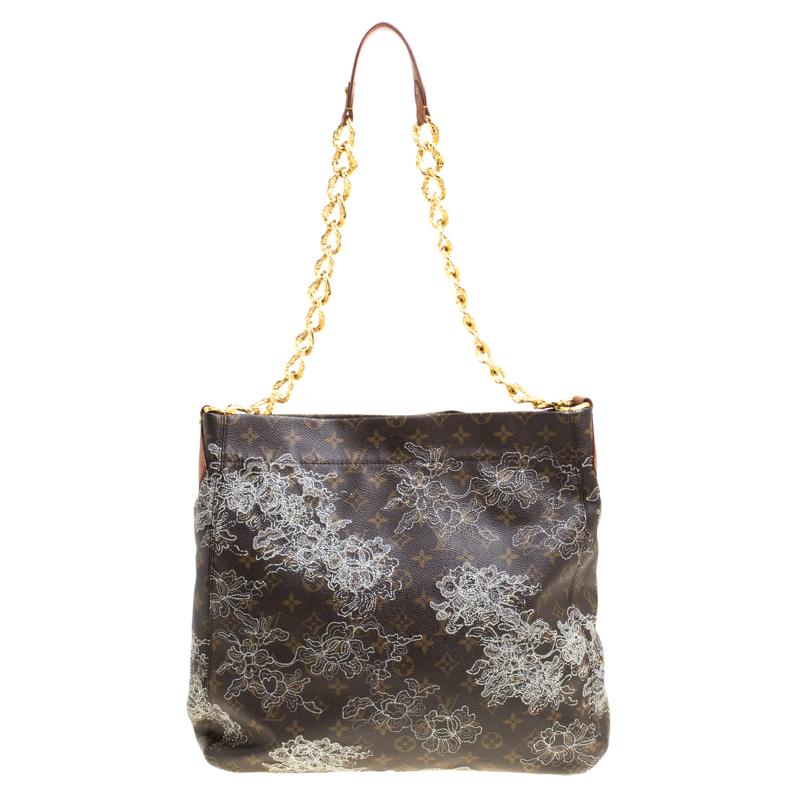 Named after the character Count Axel Fersen from the film Marie Antoinette, this Louis Vuitton Dentelle Fersen GM bag is a limited edition piece designed fabulously with specific attention given to every small detail. It is crafted of brown monogram