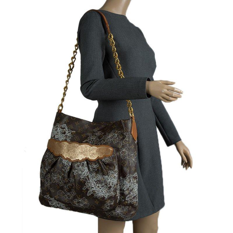 Louis Vuitton Dentelle Fersen GM bag is named after the character Count Axel Fersen from the film Marie Antoinette. It is crafted of brown monogram coated canvas with caramel leather trim and has delicate lurex lace embroidery all over the bag. The