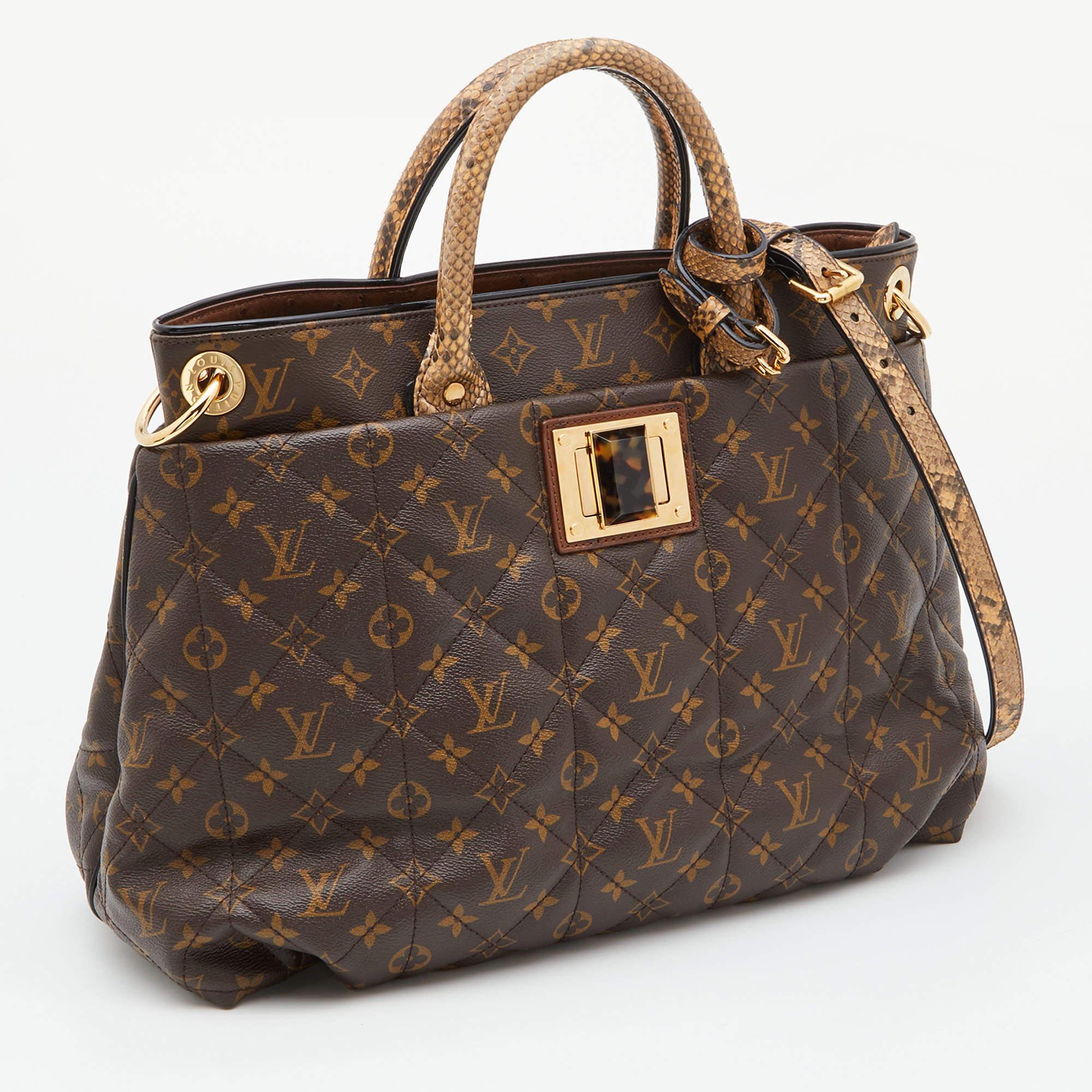 The luxurious and rare edition of the Etoile Exotique GM Bag from Louis Vuitton is crafted in the signature LV Monogram canvas. The tote comes equipped with python top handles and a shoulder strap that can be removed. Gold-tone hardware lends it a