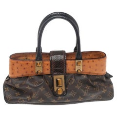 Pre-owned Louis Vuitton Ostrich & Python Majestueux MM ($5,400