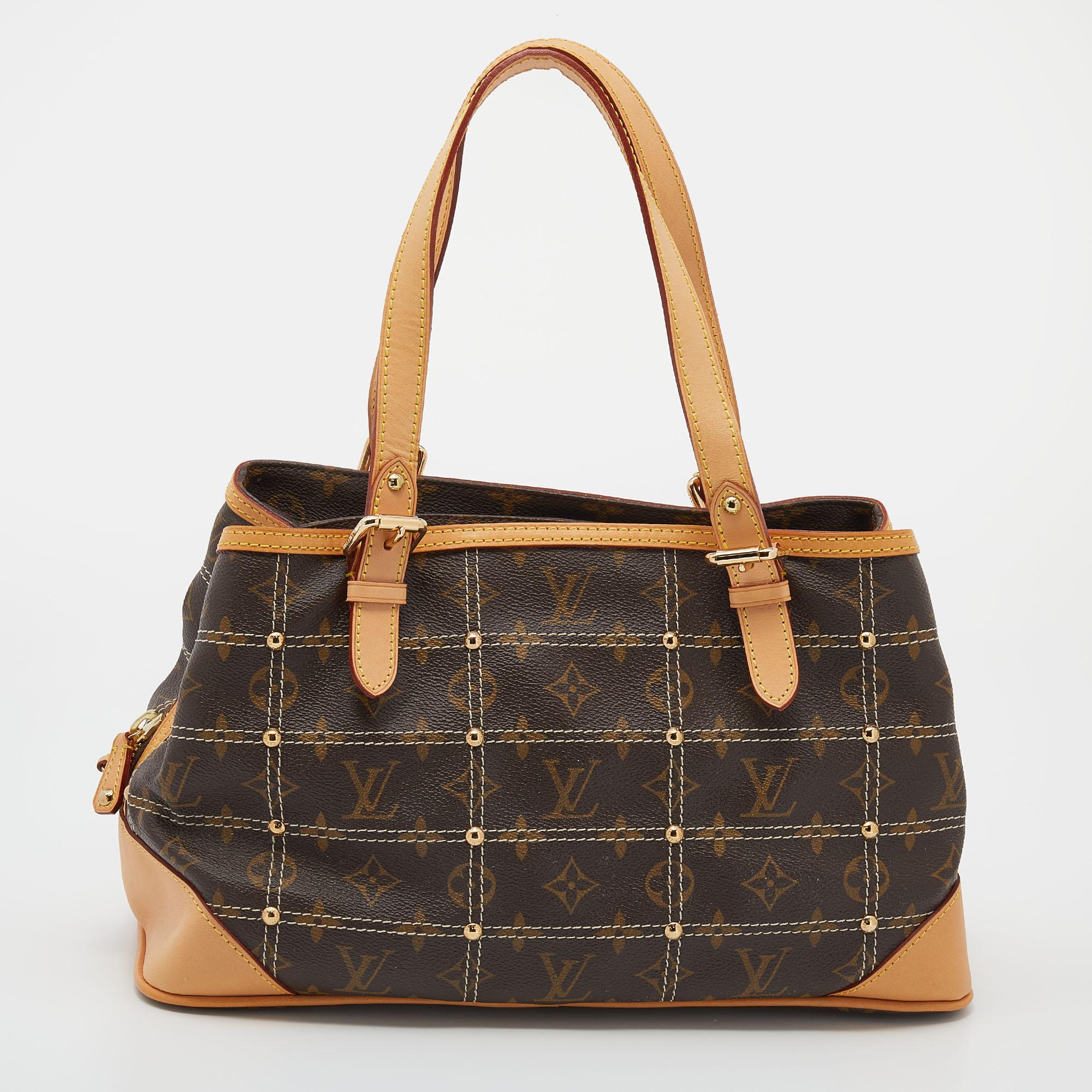 Louis Vuitton's special Riveting bag in limited edition, just for you! Made in France, this amazing bag arrives in monogram canvas and leather. It features dual top handles, gold-tone hardware, zip detailing on the exterior, and the LV Inventeur