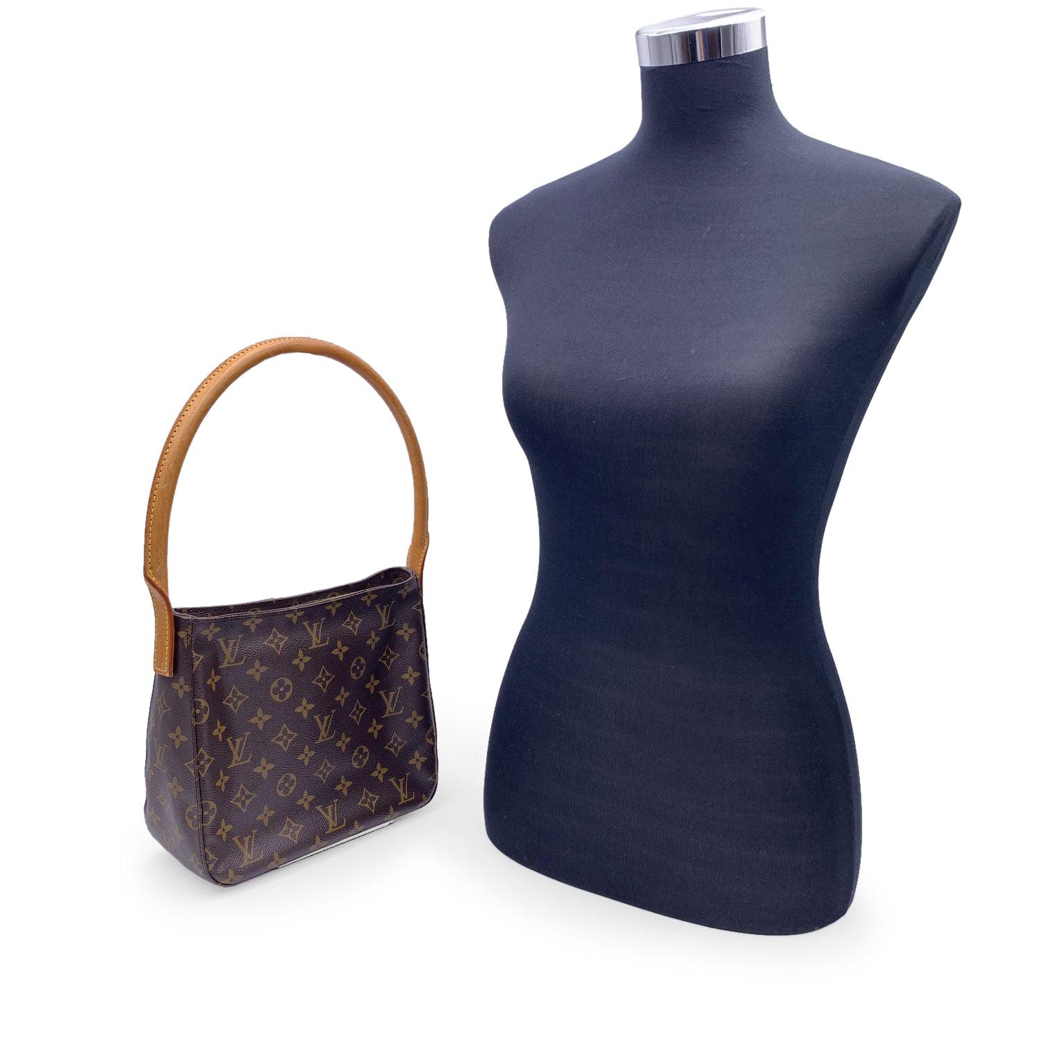 Elegant, practical, and effortlessly iconic-the Louis Vuitton Looping MM bag is a beloved classic from the golden age of early 2000s LV design. Crafted in the house's timeless monogram canvas, this is the medium-sized gem from the Looping