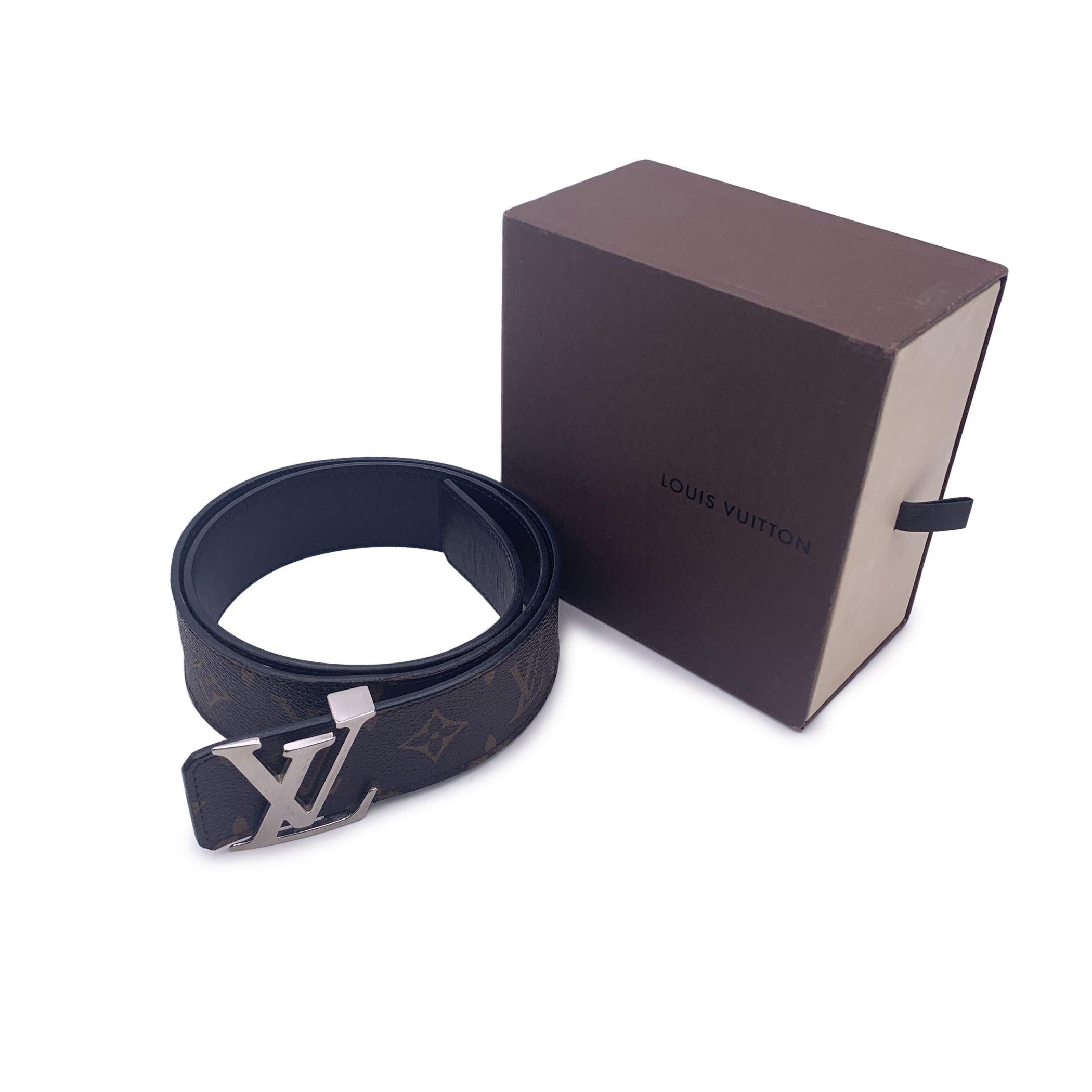This beautiful Bag will come with a Certificate of Authenticity provided by Entrupy. The certificate will be provided at no further cost LOUIS VUITTON reversible LV Initiales Belt crafted of brown canvas and black leather, Mod. M9821. Inspired by