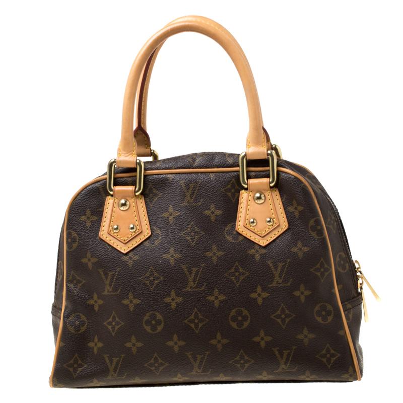 Own this gorgeous Manhattan PM Bag by Louis Vuitton today and flaunt it wherever you go. The bag has been crafted from their signature Monogram canvas and lined with Alcantara on the insides. It is equipped with two push lock pockets at the front