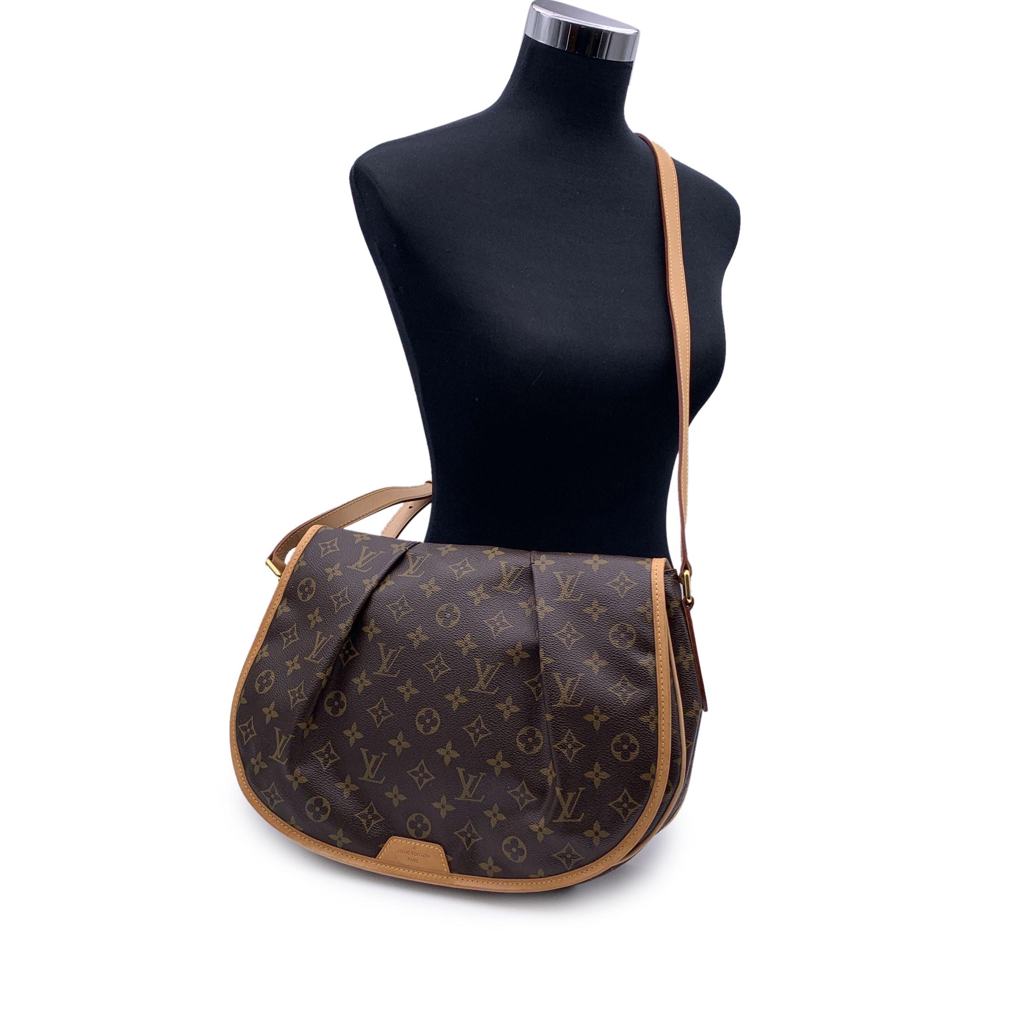This beautiful Bag will come with a certificate of authenticity provided by Entrupy. The certificate will be provided at no further cost LOUIS VUITTON 'Menilmontant MM' shoulder bag. It features brown monogram canvas with leather trim and adjustable