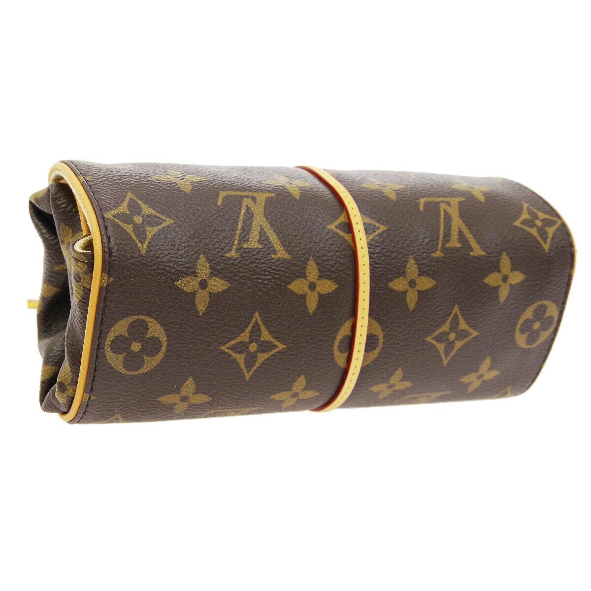 
Monogram canvas
Leather 
Gold tone hardware 
Velvet lining
Tie closure
Date code present
Made in France
Measures 8