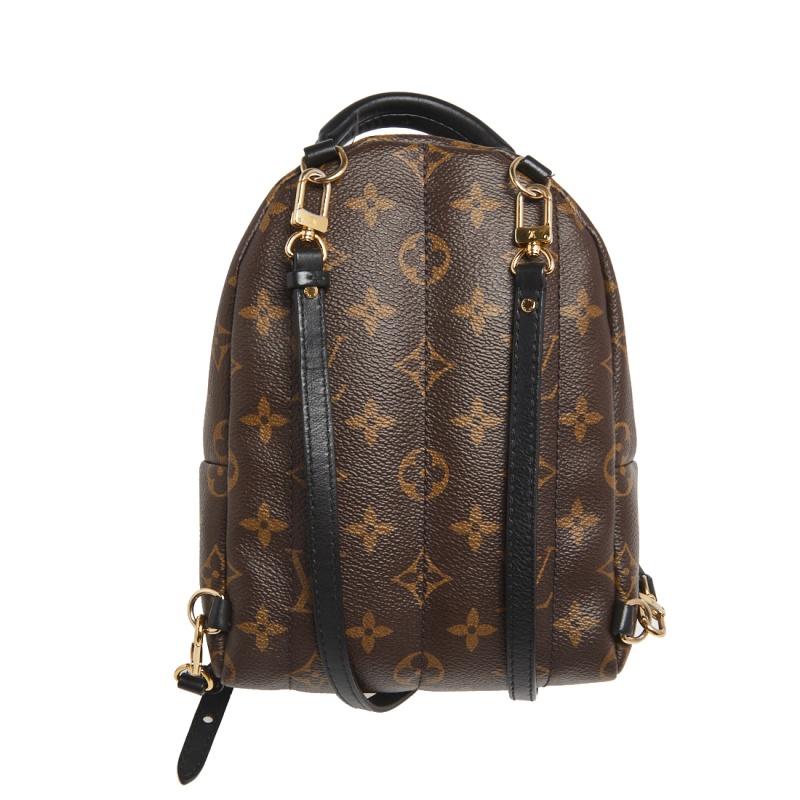 The Palm Springs backpack from Louis Vuitton is a practical staple and an on-point city bag. This stylish creation is crafted from monogram canvas and detailed with gold-tone hardware. The optional adjustable straps will provide a hands-free