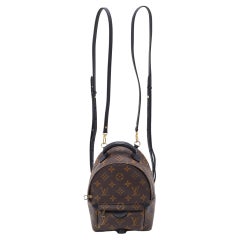 Louis Vuitton - Mini sac à dos Palm Springs en toile avec monogramme