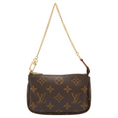 Louis Vuitton - Mini-pochette en toile avec monogramme