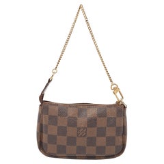 Monogrammierte Segeltuch-Mini-Pochette-Accessoires von Louis Vuitton