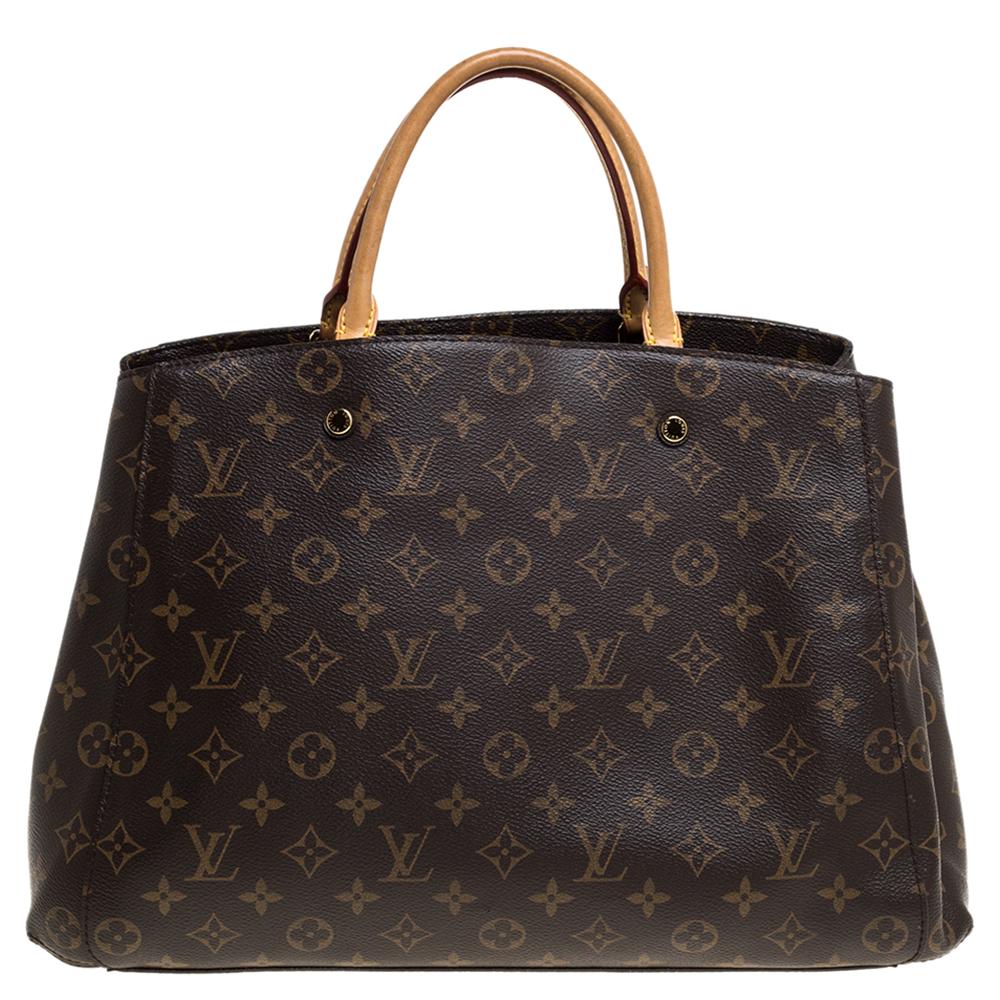 A handbag should not only be good-looking but also functional, just like this Montaigne GM bag from Louis Vuitton. Crafted from Monogram coated canvas, this gorgeous number has a spacious Alcantara interior that is divided by a zip compartment. It