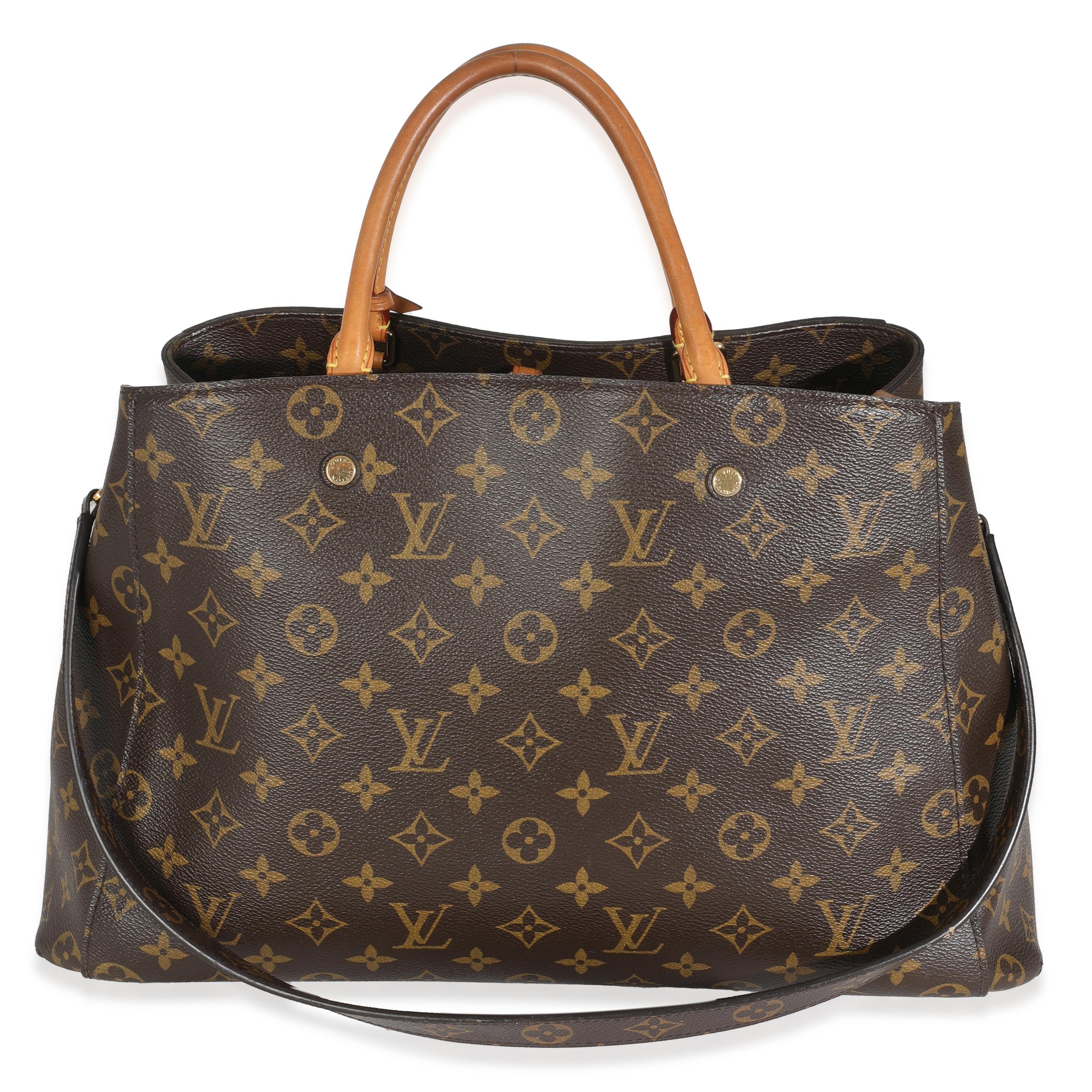 Listing Title: Louis Vuitton Monogram Canvas Montaigne GM
SKU: 147606
MSRP: 2620.00 USD
Condition: Pre-owned 
Handbag Condition: Very Good
Condition Comments: Item is in very good condition with minor signs of wear. Peeling along handle glazing.