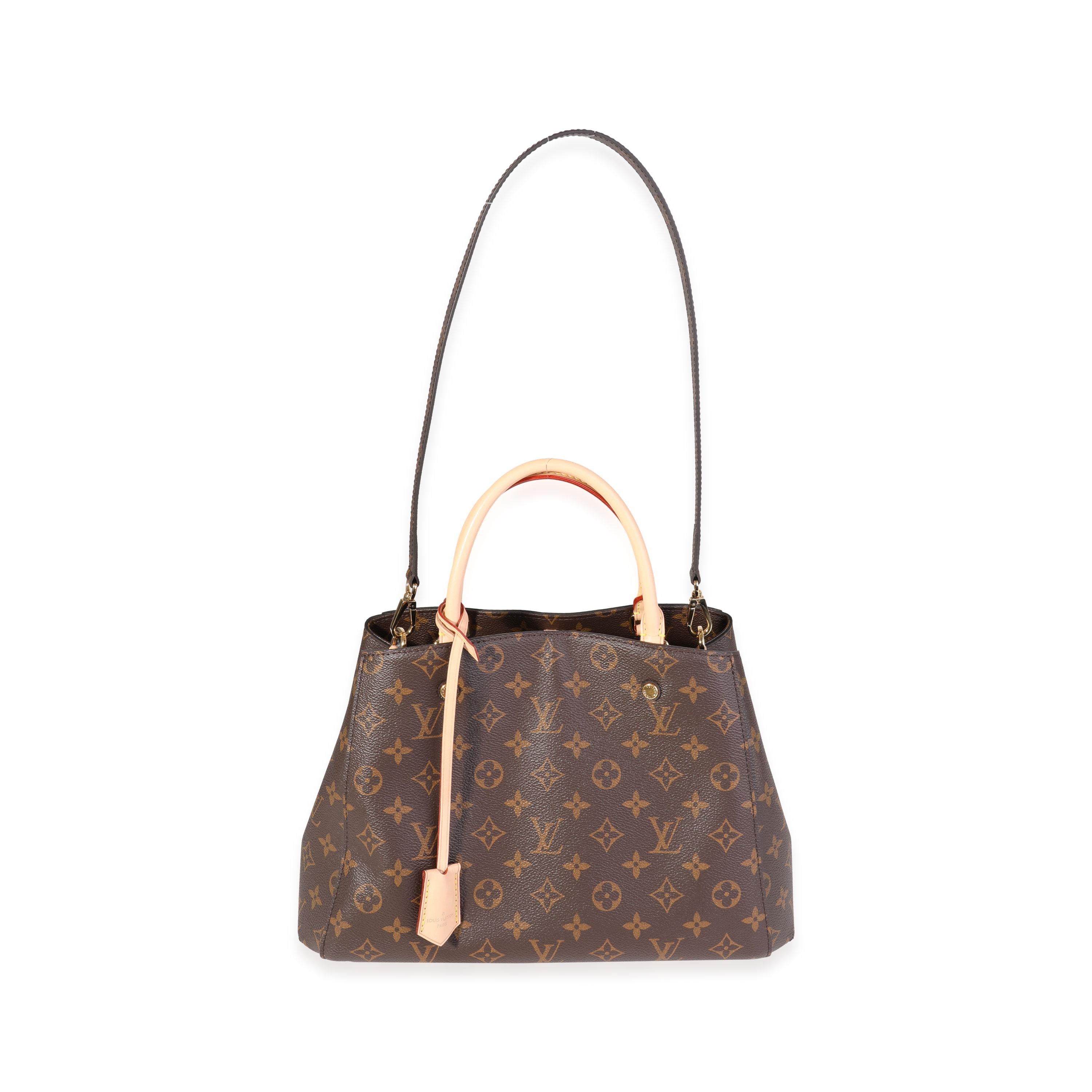Listing Title: Louis Vuitton Monogram Canvas Montaigne MM
SKU: 120684
MSRP: 2910.00
Condition: Pre-owned 
Handbag Condition: Very Good
Condition Comments: Very God Condition. Scratching to hardware. Light discoloration to interior lining.
Brand: