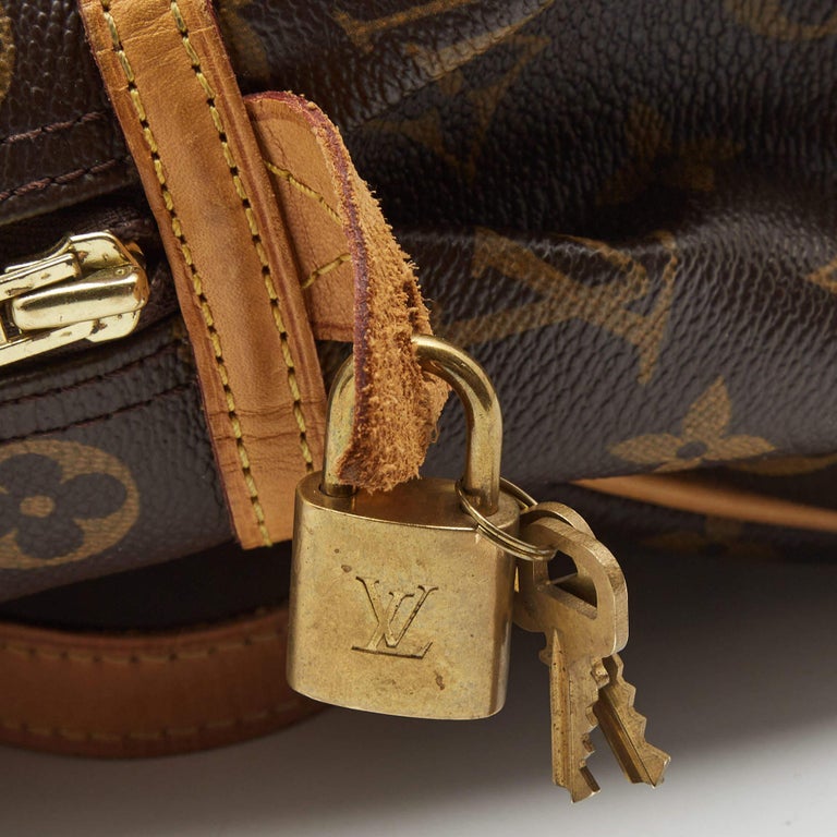 LOUIS VUITTON MONTORGUEIL GM Handbag Includes: ORIG LOCK & KEYS.