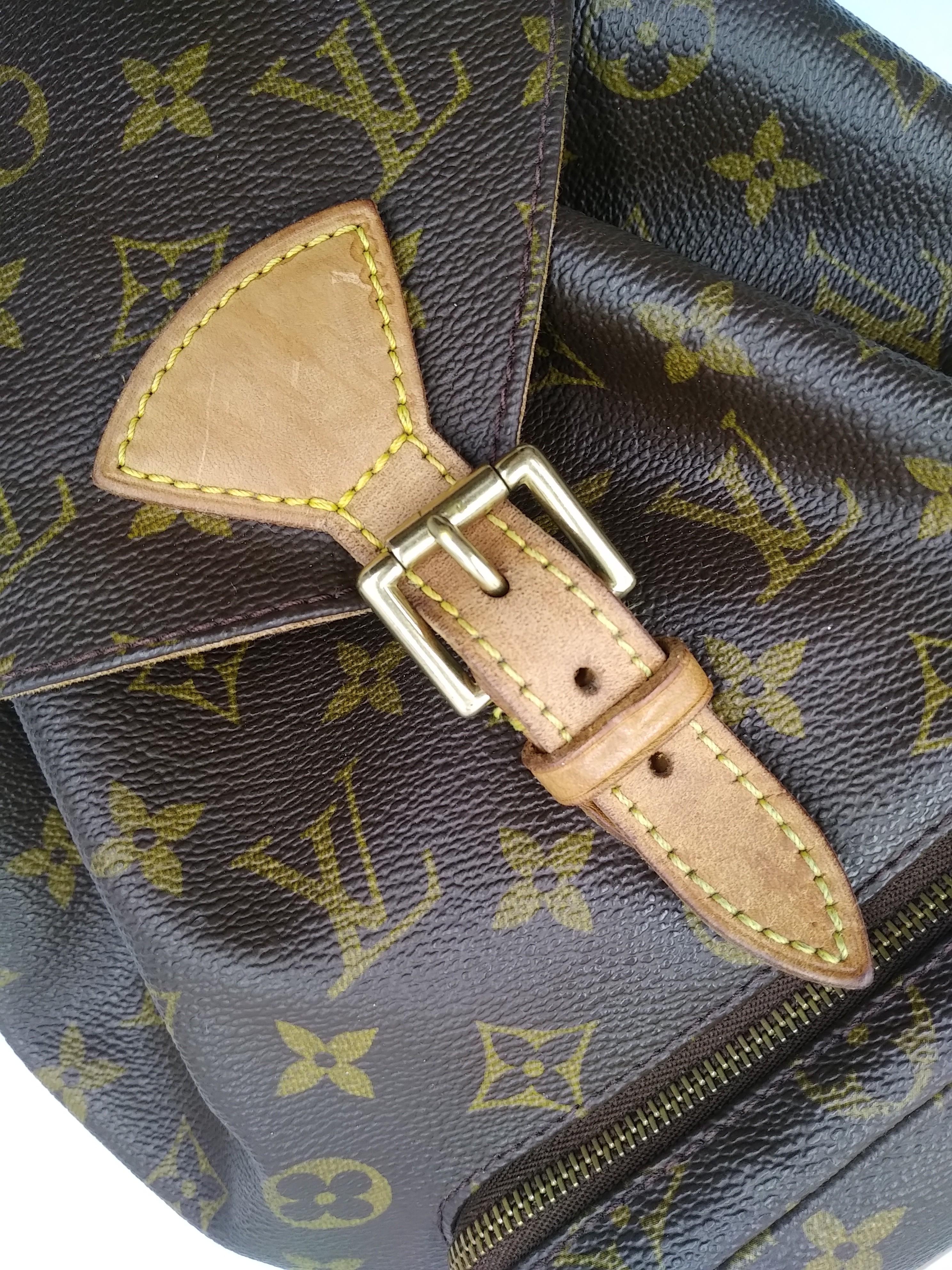 Louis Vuitton Monogram Canvas Montsouris PM Backpack Bag, 1998
- 100% authentic Louis Vuitton
- Monogram coated canvas with leather trim
- Flap closure with buckle closure and cinching leather drawstring
- Natural cowhide adjustable buckled straps
-