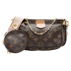Louis Vuitton, bolso multiusos «Pochette» de lona Monogram para accesorios