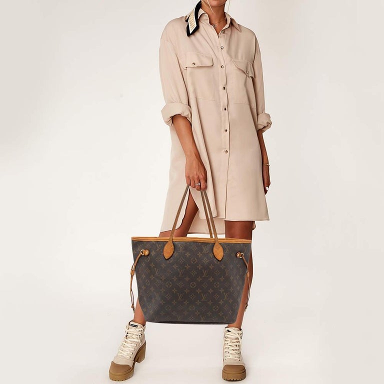Introduced in 2007, the Neverfull by Louis Vuitton is applauded for its innovative design and faultless craftsmanship. This MM bag comes crafted from Monogram canvas, and its classy features contribute to its timeless elegance. With a structured
