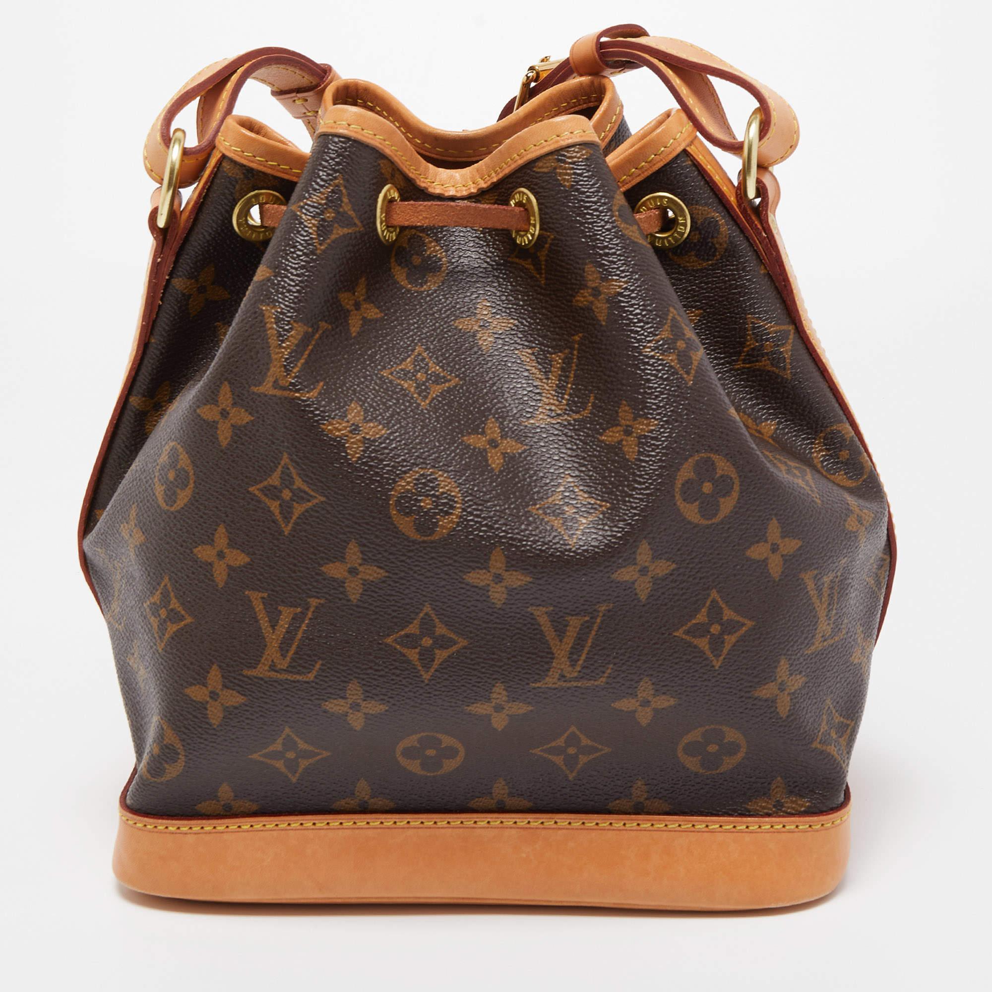 Made in 1932 by Louis Vuitton to carry bottles of champagne, the iconic Noe now serves as a stylish handbag. Crafted from Monogram canvas and leather, the Noe BB exudes just the right amount of sophistication. It has a single shoulder strap and a