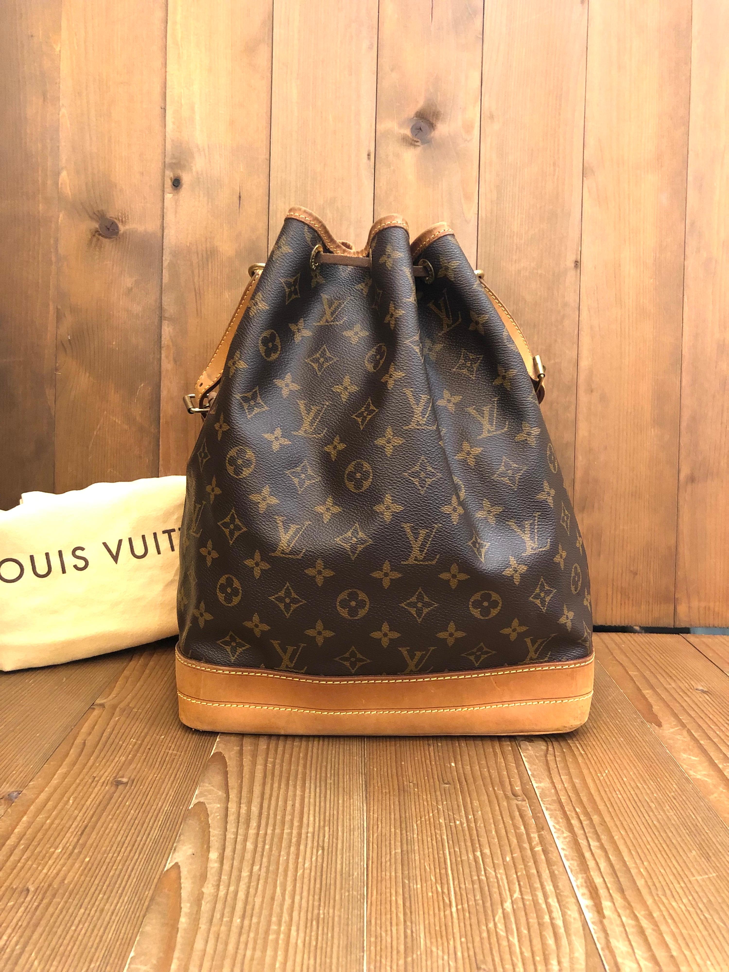 Louis Vuitton Noe GM shoulder bag in brown monogram canvas and vachetta leather. It was originally created in 1932 to carry bottles of Champagne.Made in France in 2011 with date-code AR0151. Measures 10 x 13.75 x 7.5 inches Strap drop 11 inches.
