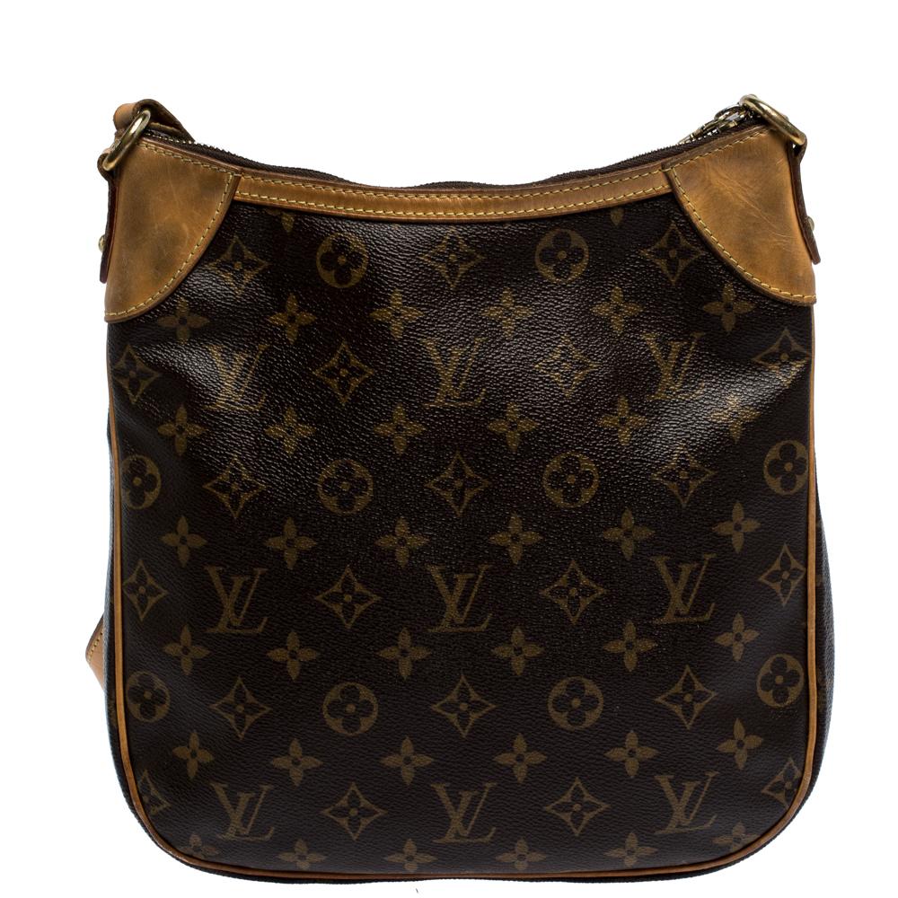 A smart and practical bag for everyday use, this Louis Vuitton Odeon bag is crafted from the brand's signature monogram canvas and styled with leather trims. It comes with a top zip closure and is equipped with an adjustable shoulder strap. This bag