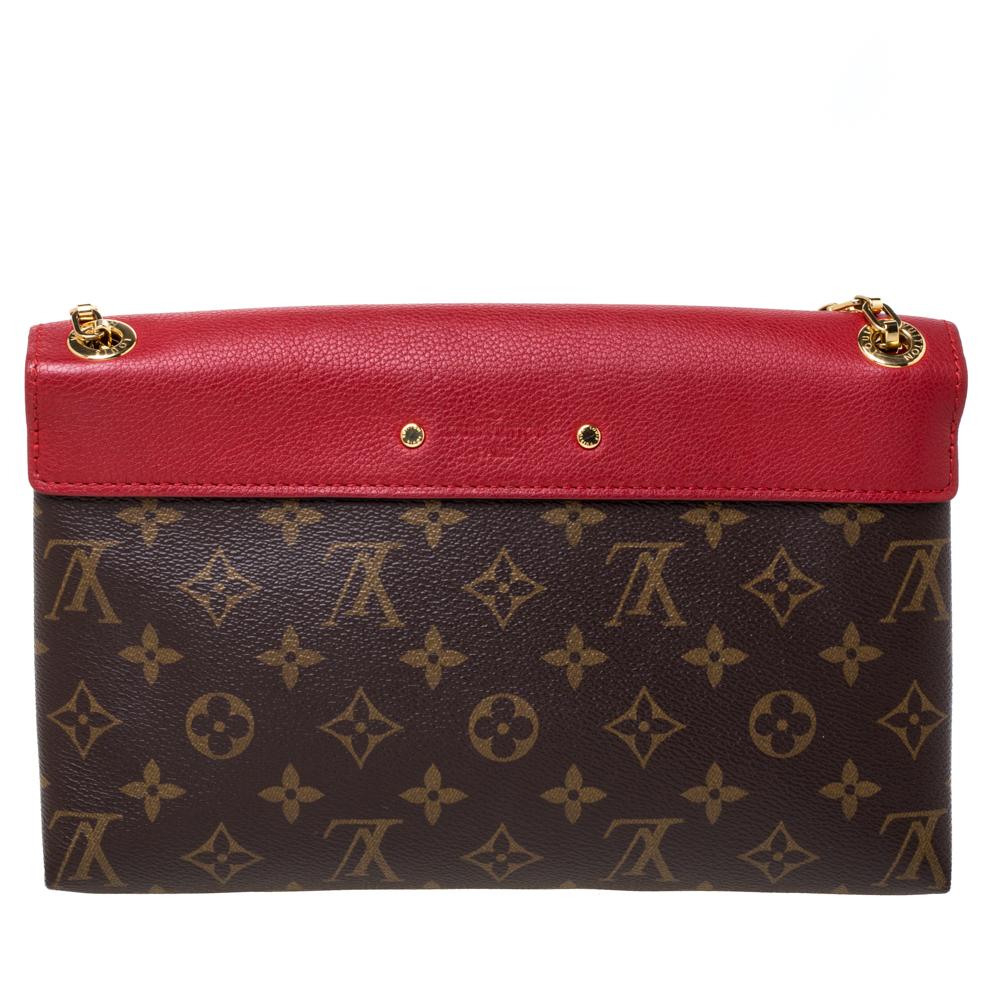 Accessorise like a pro with this trendy and functional bag from Louis Vuitton. This rich and classy Pallas bag is made from monogram coated canvas and leather into a smart silhouette. The inside of the bag is lined with suede that has a smooth