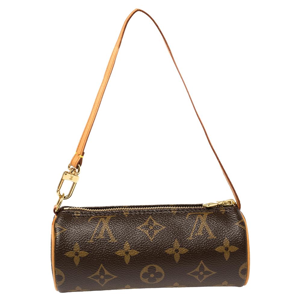 One of the most iconic shapes made by Louis Vuitton, the Papillon is a handbag that will remain stylish for years to come. Its exterior is made from Louis Vuitton's monogram canvas with contrasting tan leather trim and flat shoulder straps. The