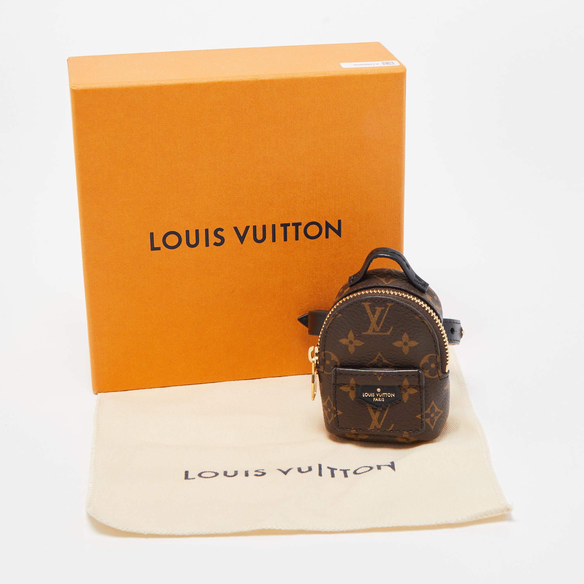 The Louis Vuitton Party Palm Springs bracelet is a luxurious accessory featuring the iconic LV monogram pattern on canvas. Designed to wrap around the wrist, it exudes elegance with a touch of casual charm, making it the perfect addition to any