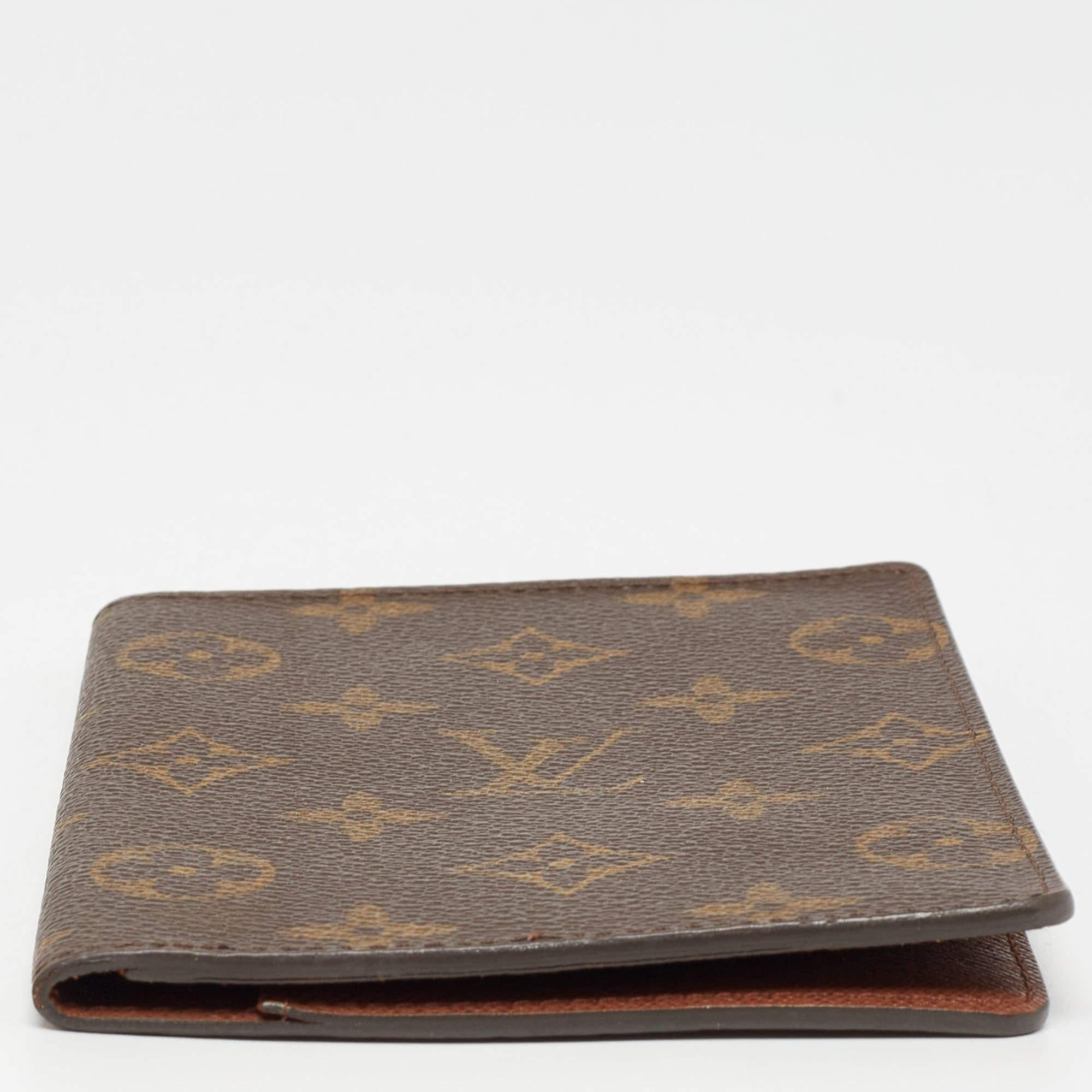 Keep your passport and credit cards organized while you travel, in this chic passport cover by Louis Vuitton. Its exterior is made from coated canvas. It opens to reveal multiple slots for ease of storage.

