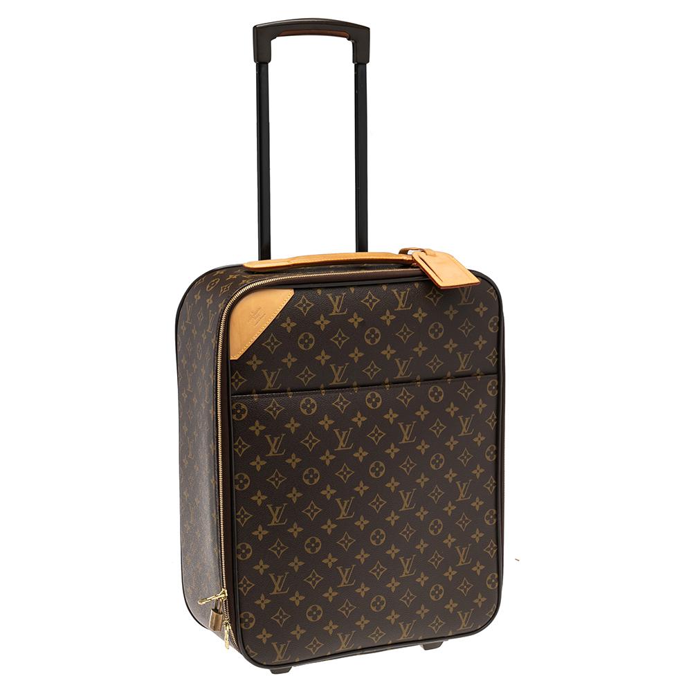 Taking Louis Vuitton's legendary art of travel elegantly forward, the Pegase 45 luggage bag, crafted from Monogram canvas and leather, flaunts traditional craftsmanship and an innovative, modern design. Lightweight, robust, and ultra-mobile, it