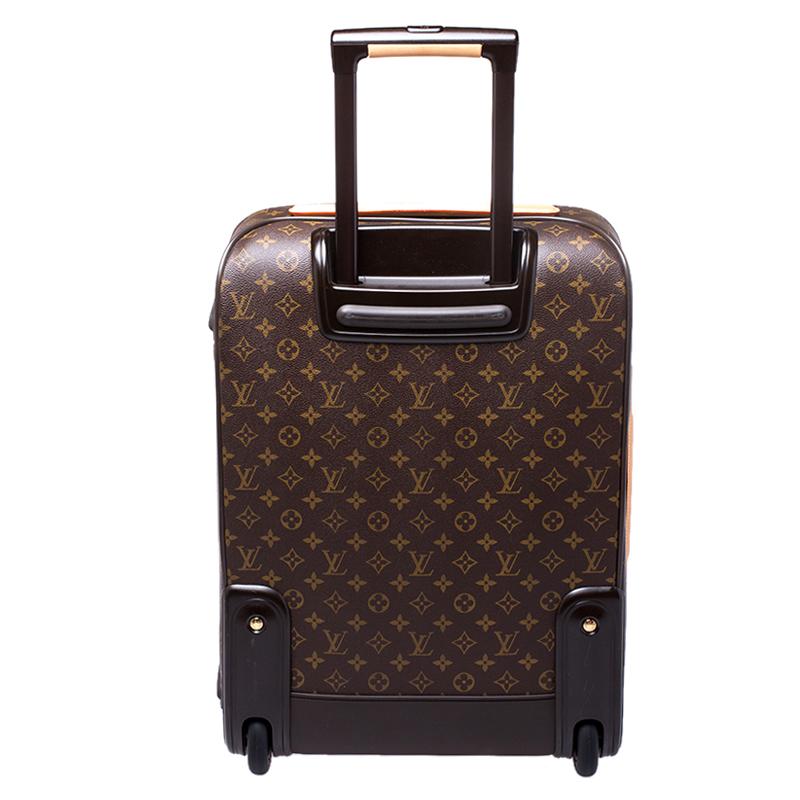 Elegantly renewing Louis Vuitton's legendary art of travel, the Pegase 55 trolley case in monogram canvas combines traditional craftsmanship with innovative, modern design. Lightweight, robust and ultra-mobile, it glides along smoothly on its two