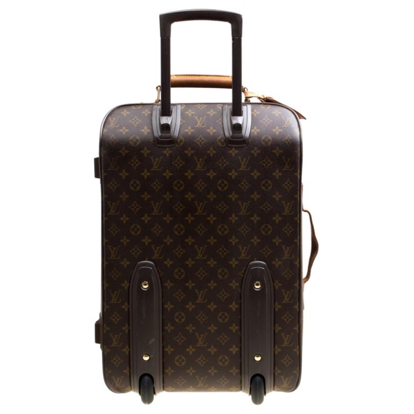 Say hello to your new travelling partner from Louis Vuitton. The exterior has been crafted from monogram coated canvas as well as leather, and the spacious interior is lined with canvas. Equipped with sturdy handles, two wheels and a telescopic