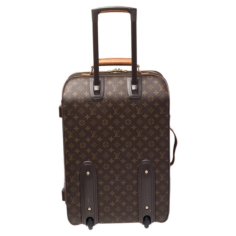 Taking Louis Vuitton's legendary art of travel elegantly forward, the Pegase 55 trolley case crafted from monogram canvas flaunts traditional craftsmanship and a classic design. Lightweight, robust, and ultra-mobile, it glides along smoothly on its