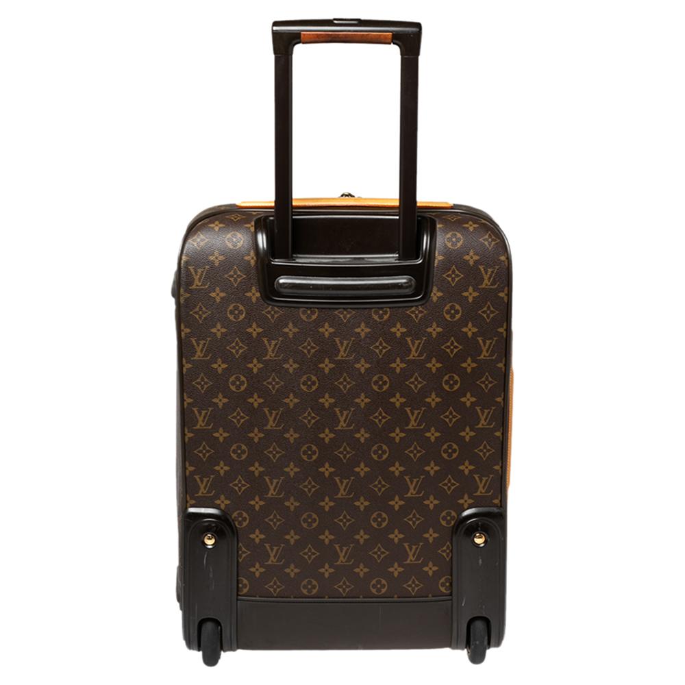 Say hello to your new traveling partner from Louis Vuitton. The exterior has been crafted from monogram canvas while the spacious interior is lined with nylon. Equipped with a zip compartment at the front, sturdy handles, two wheels, and a