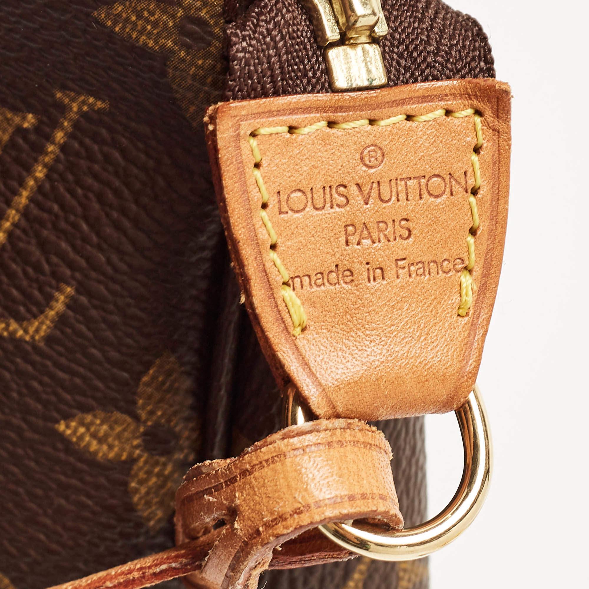 Louis Vuitton Monogrammierte Segeltuch-Pochette-Accessoires 1