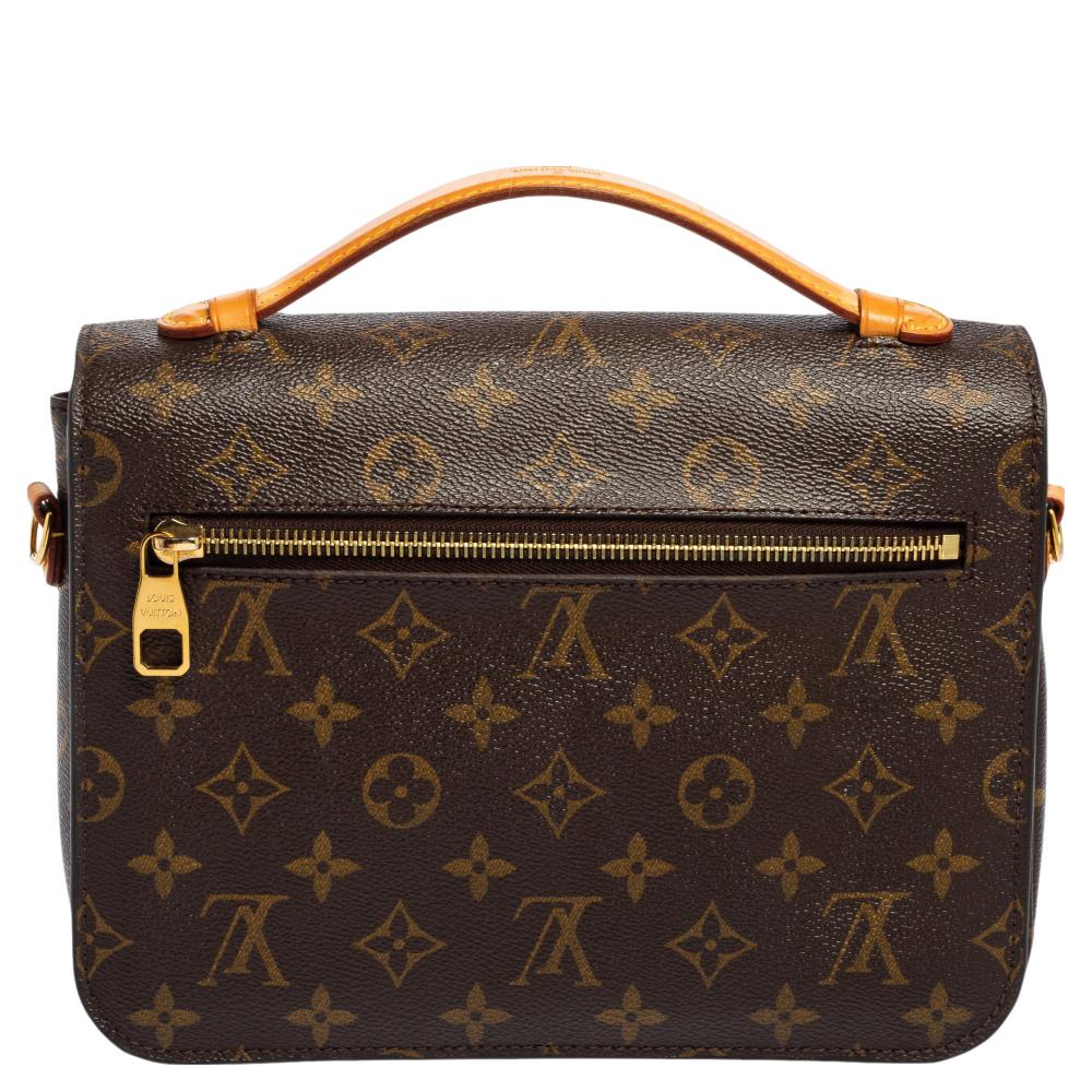 This elegant pochette Metis bag from Louis Vuitton is simple in design. Crafted from Monogram canvas, the bag features a front flap with a gold-tone engraved push-lock closure. A single leather handle and a detachable shoulder strap ensure you carry