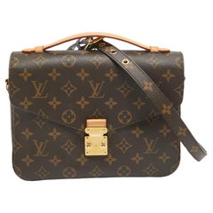 Louis Vuitton Monogrammierte Canvas Pochette Metis-Tasche aus Segeltuch