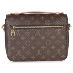 Monogrammierte Segeltuch-Pochette Metis von Louis Vuitton