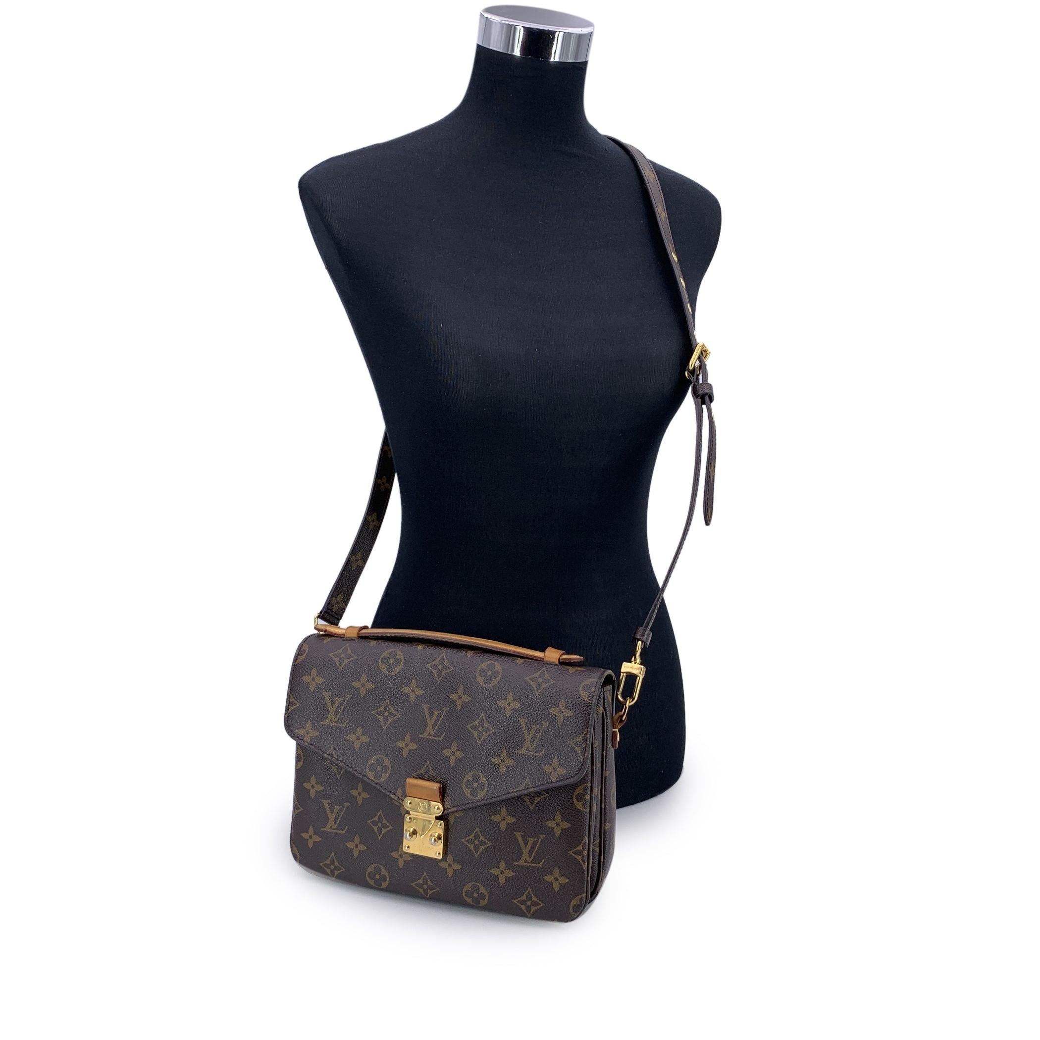 This beautiful Bag will come with a Certificate of Authenticity provided by Entrupy. The certificate will be provided at no further cost. Step into the world of timeless elegance with this beautiful Louis Vuitton 'Pochette Metis' handbag. Crafted in